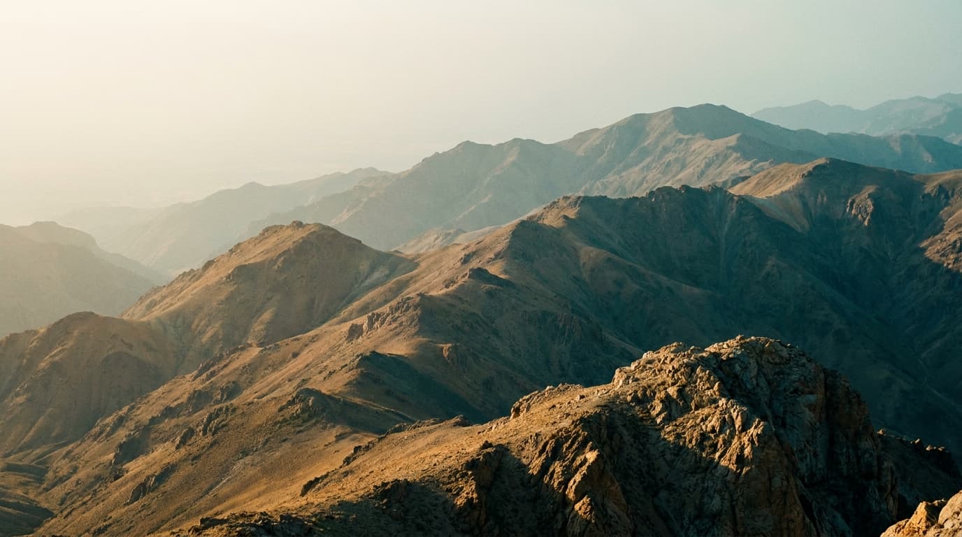 Elevated relief view of Central Asian mountain terrain at dawn