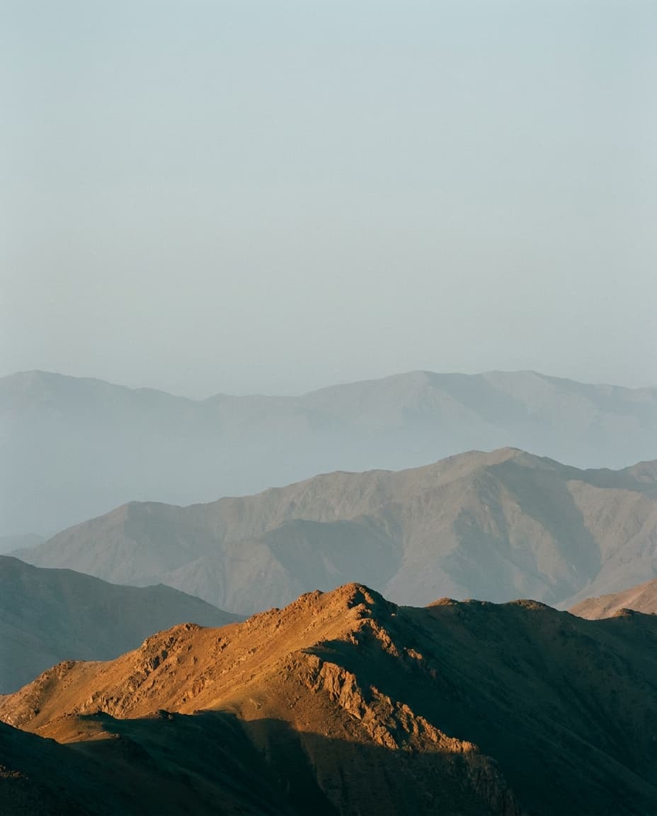 Elevated relief view of Central Asian mountain terrain at dawn